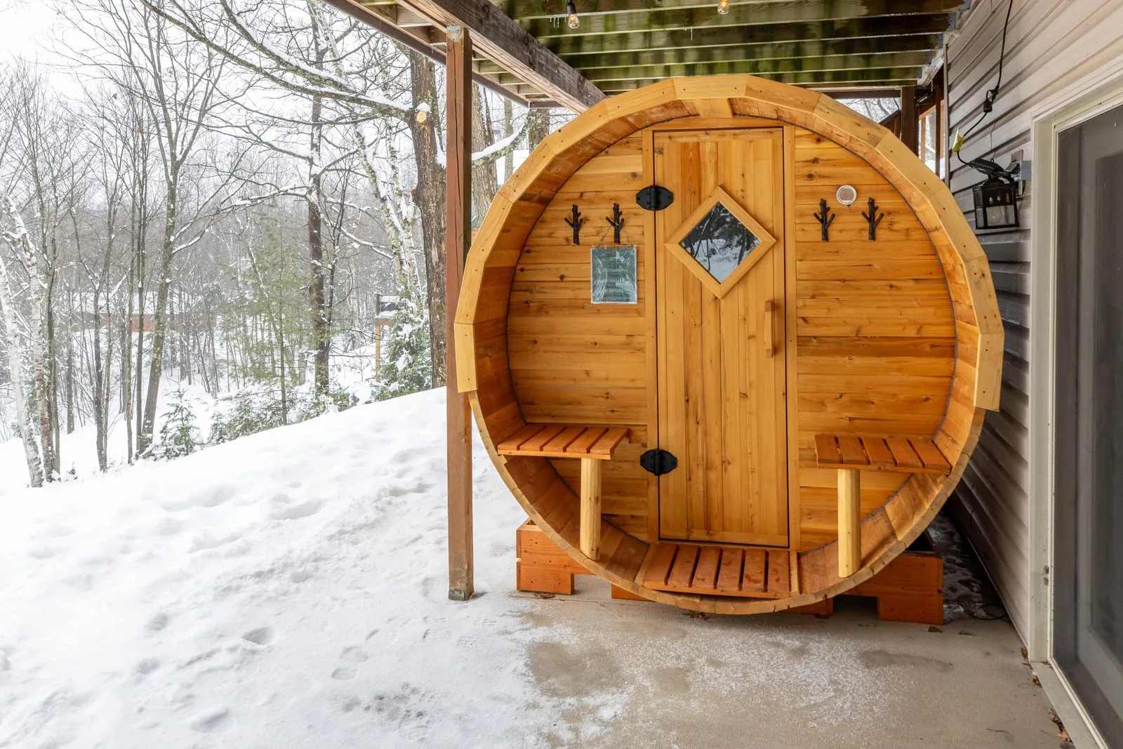 Cedar barrel sauna in the snow