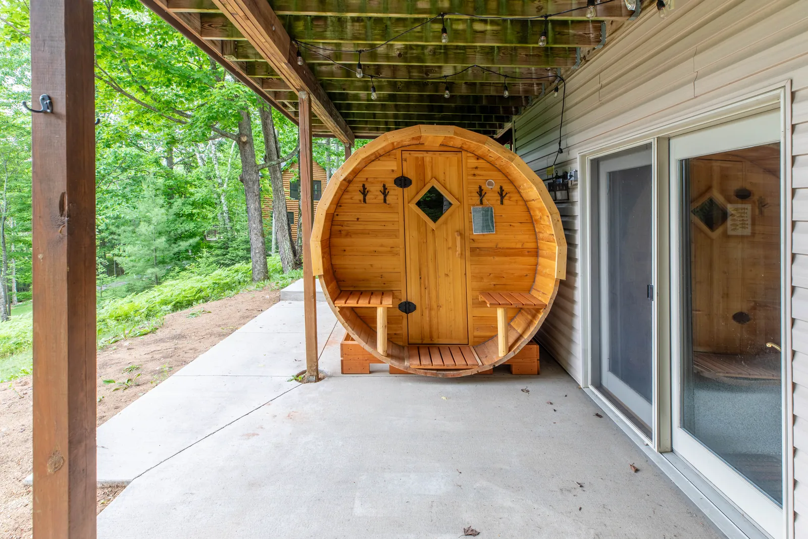 Cedar barrel sauna under the pines