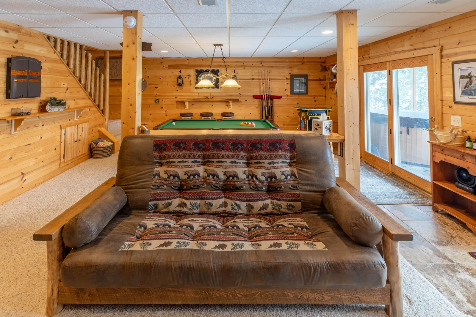 Game room with pool table and arcade